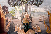 Chiang Mai - Wat Phra That Doi Suthep. The walls of the gallery are covered with Buddha statues and mural paintings of Jataka and tales of the previous lives of the Buddha.